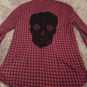 Plaid shirt with skull on back